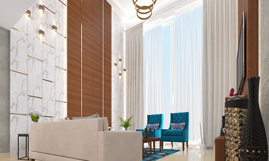 Make a statement with blue sofa chairs and white curtains in a blue and white living room