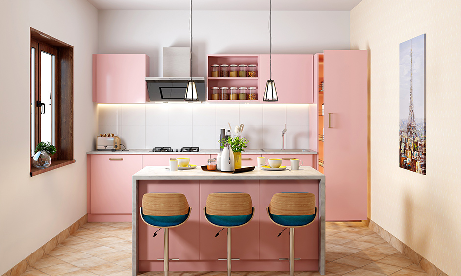 Symmetrical balance in design with a pair of identical pendant lights above the breakfast counter in the kitchen