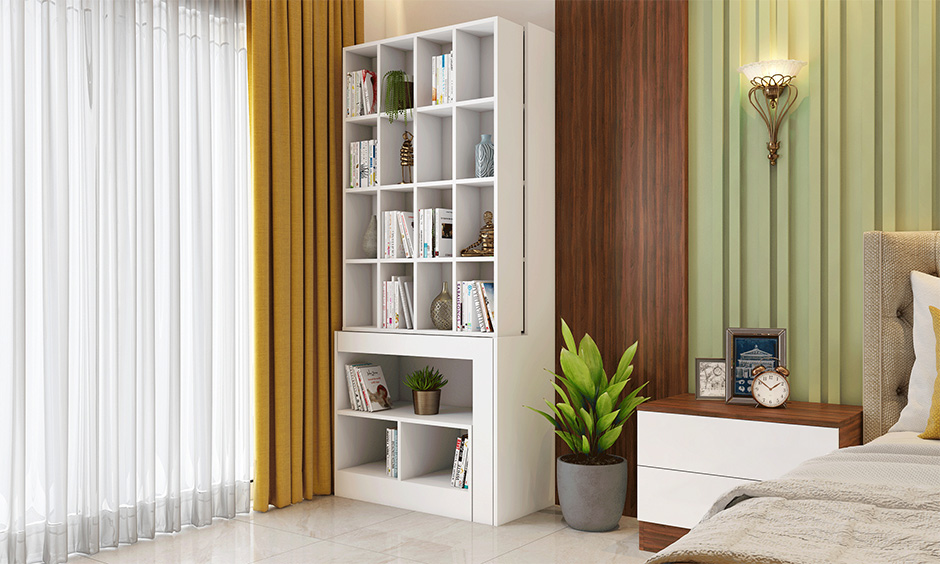 A bedroom bookshelf with a pull-out study table is ideal for young adults or teenagers at home