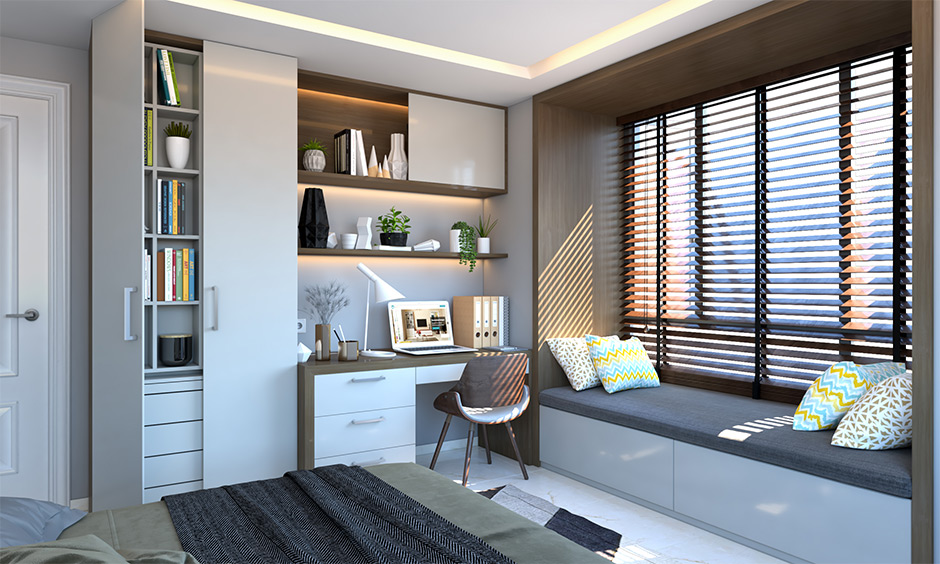 A bedroom with a study unit design and window bay seater lets you enjoy the outside view