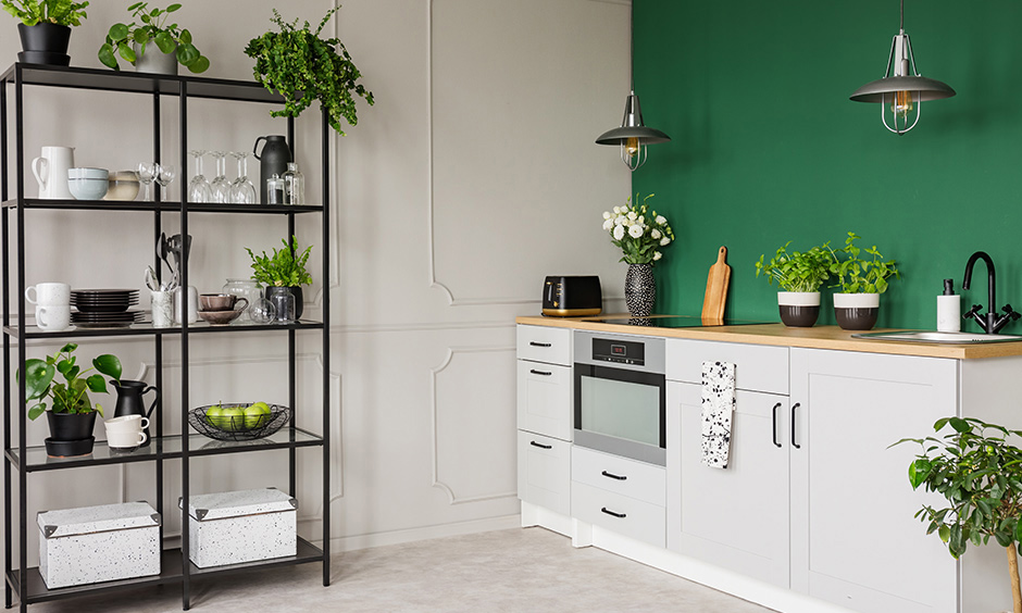 Cover the blank kitchen wall ideas with an open shelf rack for display and storage