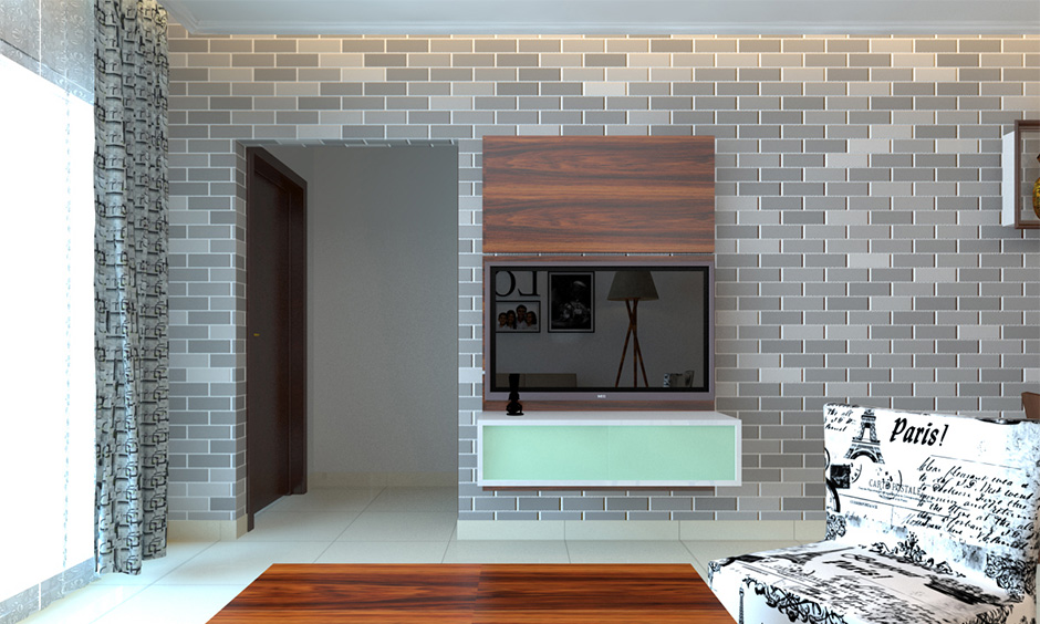 A living room brick wall design in grey and white combination adds sophisticated style to its appearance