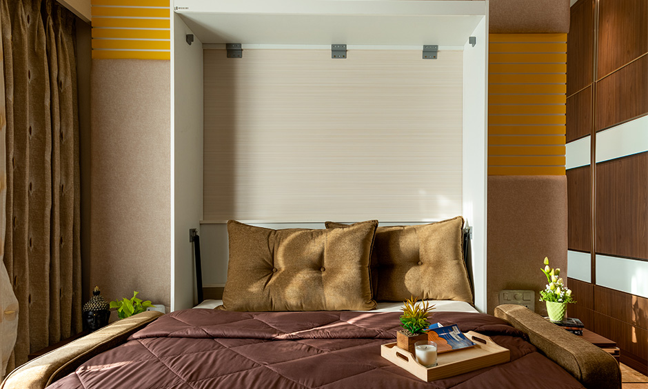 Best 3bhk home interior designer in Mulund, Mumbai, designed a comfortable murphy bed in the compact guest bedroom