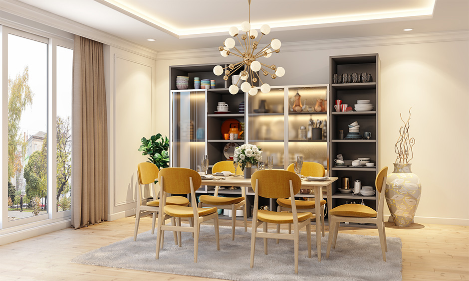 Scandinavian dining table in light-colored and yellow upholstered chairs beautifully elevates the dining room