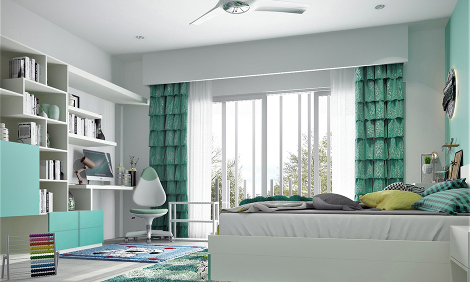 Coastal chic bedroom with sea green-inspired curtains, furniture and decor lends a serene