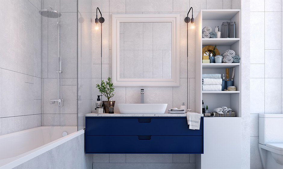 Vanity sink design in blue and white colour rules the space