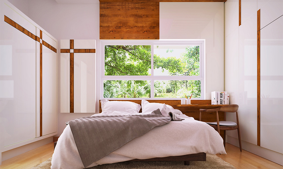 Minimalist Mediterranean bedroom design in white colour with accents of brown looks airier