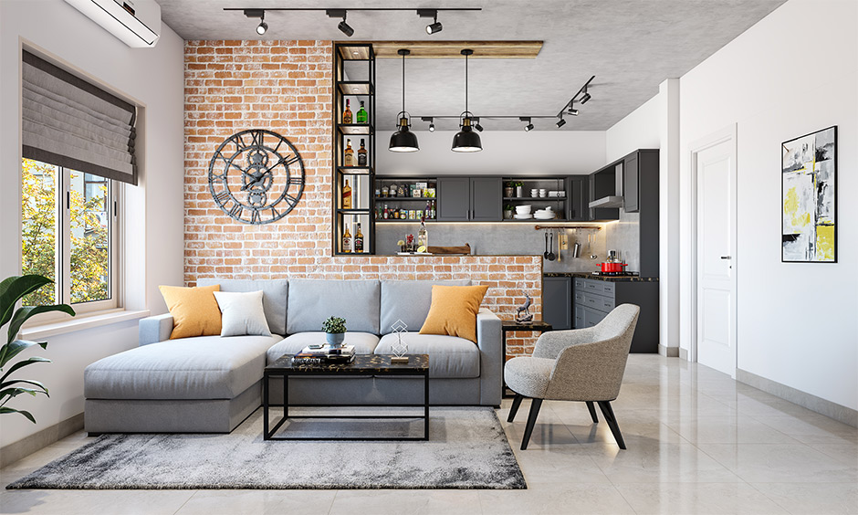 Modern living room with grey sofa for young couples living in compact apartments