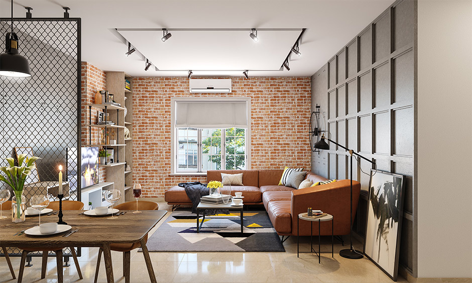 Red brick wall cladding and grey gypsum create a unique combination for your living room