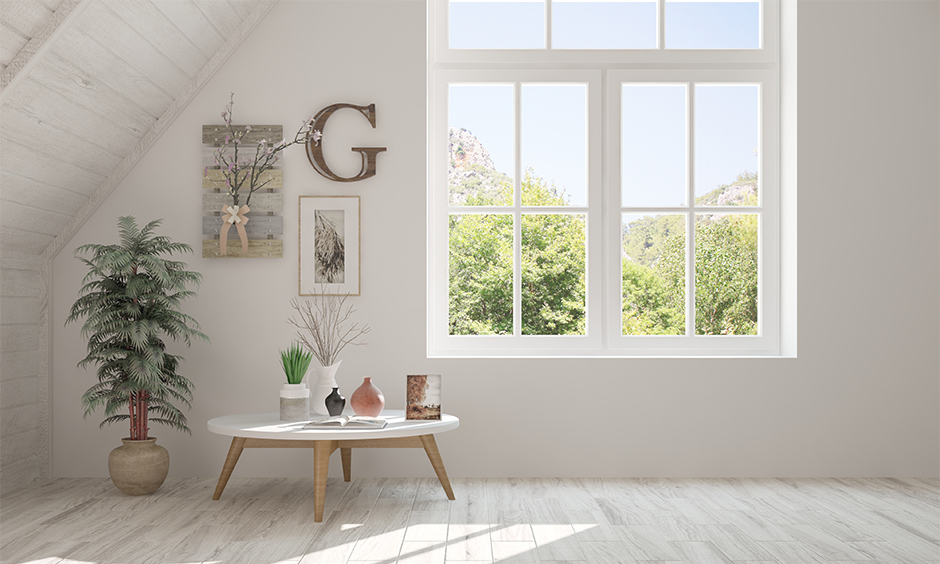 Awkward living room corner with a tall potted plant