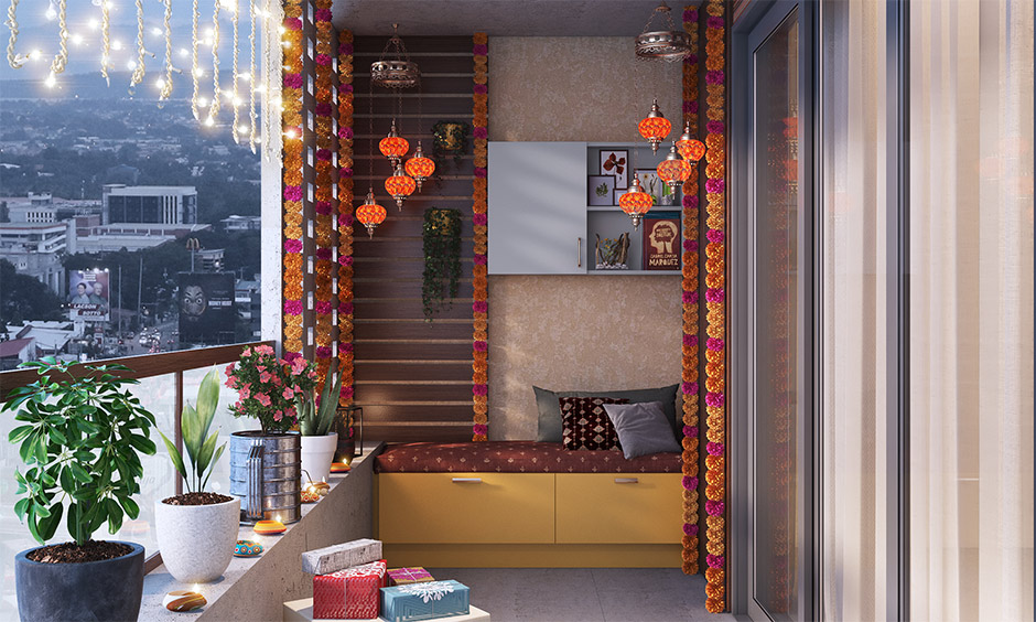 Opt for Diwali balcony light decoration with fairy lights and traditional diyas to create visual interest