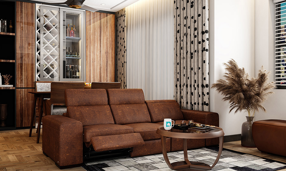 Recliner leather sofa design in the earthy-tone living room is the perfect relaxing ambiance