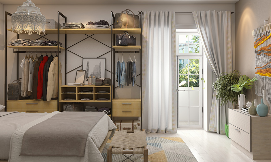 Open iron almirah design goes well with a bohemian-style bedroom