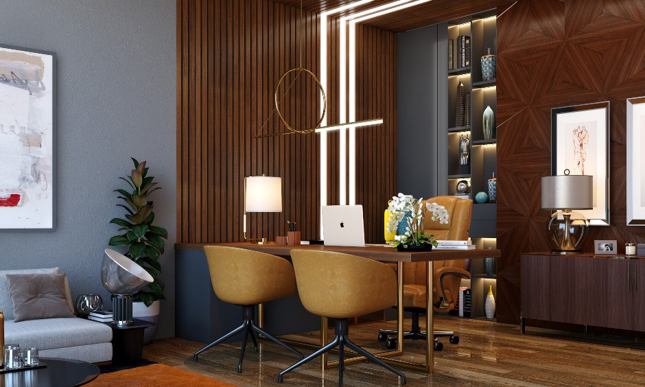 Business desk and chairs are set up in open living room with a wooden panel background