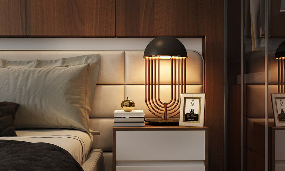 Cool bedside lamp with a rich metallic base effortlessly adds a sense of luxury