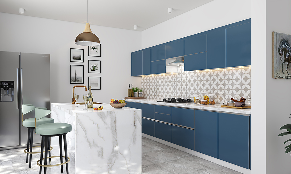 Mid-century modern kitchen design in blue and white with an island that doubles as a breakfast countertop