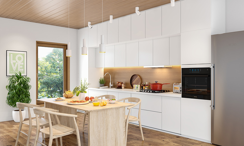 Mid-century modern kitchen with dining set and white cabinet adds a bright and airy look