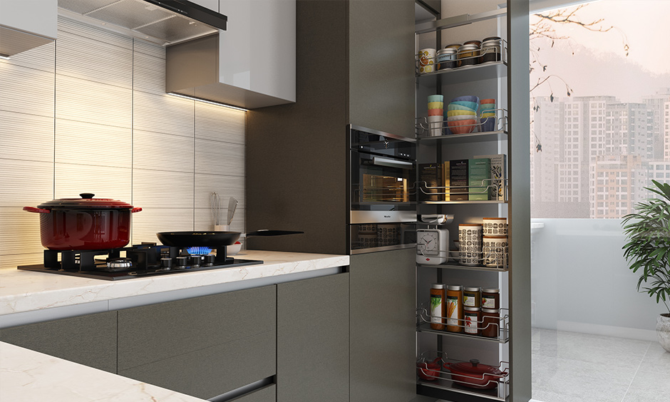 Current kitchen design trend is space-saving furniture, like a pull-out pantry that maximizes space