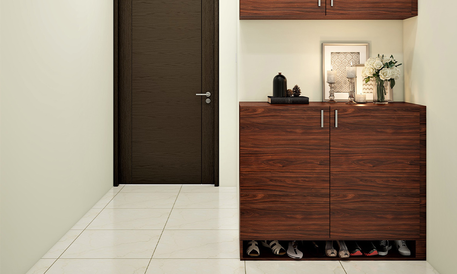 Built-in entryway shoe storage at the cabinet bottom