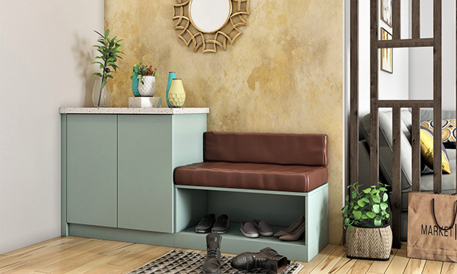 Contemporary entryway bench with built-in shoe storage solutions for an organized home