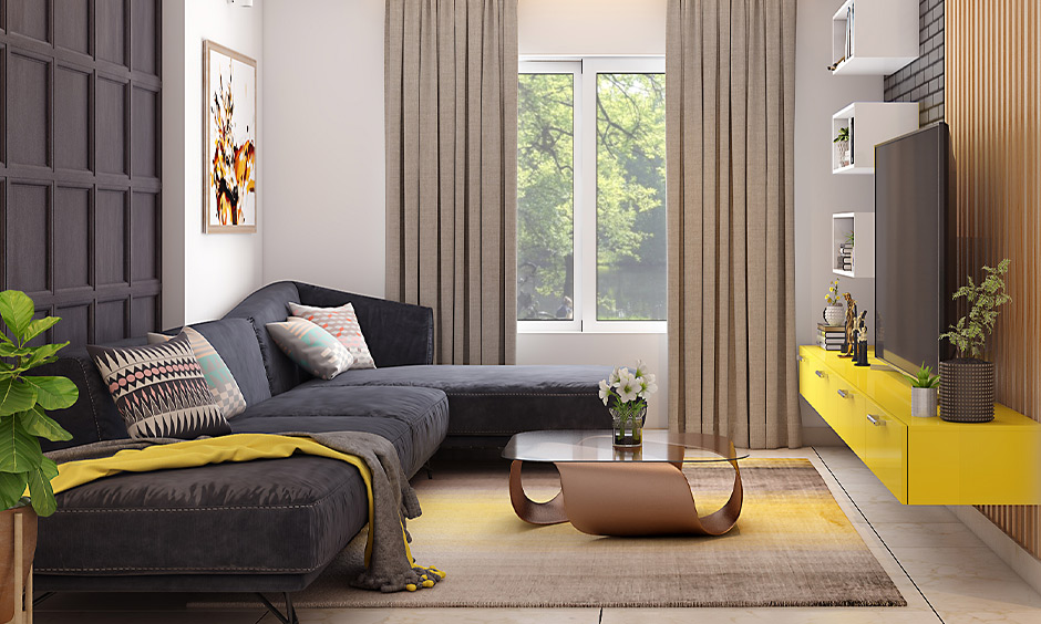 A square centre table with glass top in modern living room