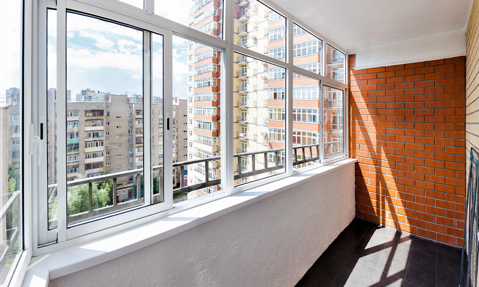 Aluminium window frames in white colours on a balcony