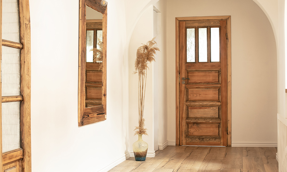 Mediterranean-style carved wooden main door design for home