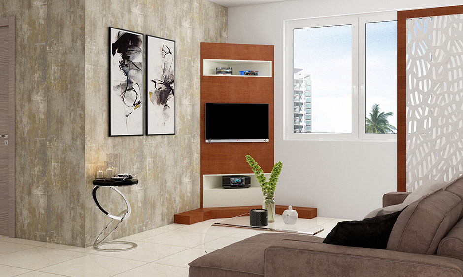 A corner tv stand s a great way to use an awkward space in your living room