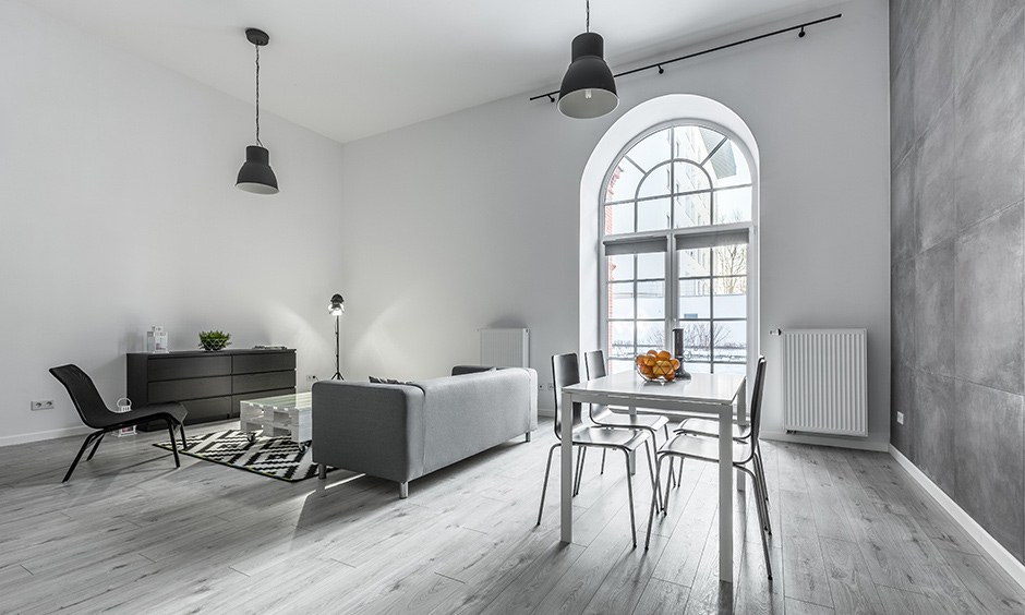 Wooden window design in french style for white open living room cum dining area