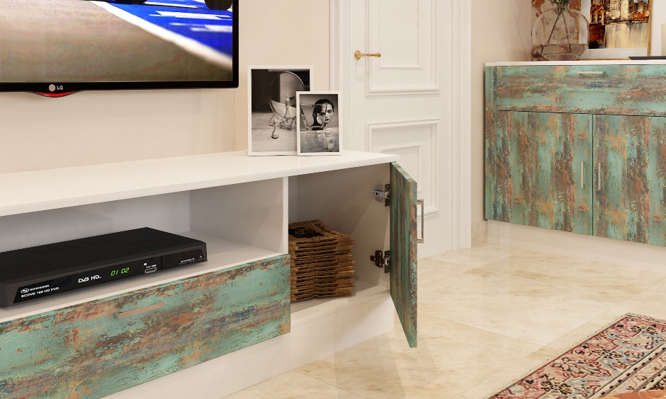 Living room tv unit with rustic green laminates featuring multiple storage options